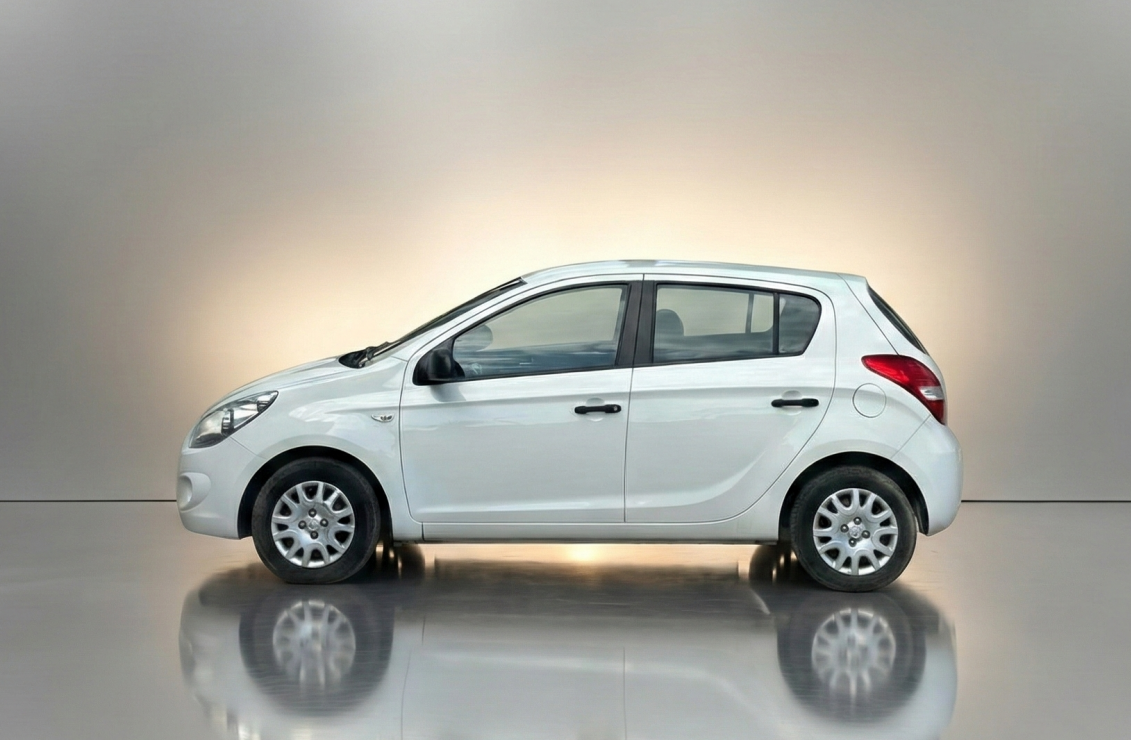 Car parked in front of a modern building during a sunny day in Ulcinj