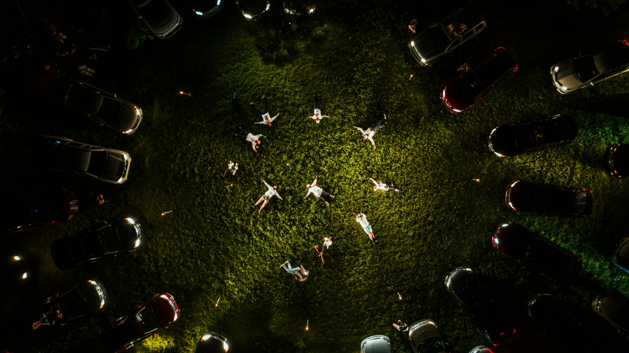 Image of cars parked in a circle facing inside